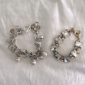 Two silver and gold colored costume bracelets